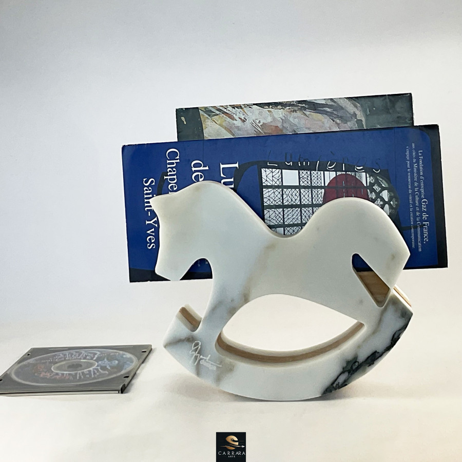DONDOLO DUO (rocking horse)  Add a touch of class and sophistication to your spaces with timeless marble-designed objects.