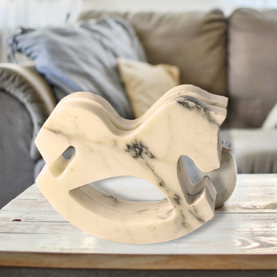 DONDOLO (rocking horse)  Add a touch of class and sophistication to your spaces with timeless marble-designed object