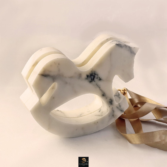 DONDOLO (rocking horse)  Add a touch of class and sophistication to your spaces with timeless marble-designed object